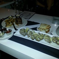 Photo taken at Knife &amp;amp; Fork Gastropub by Traci M. on 7/15/2012