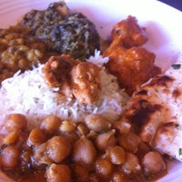 Photo taken at Streets of India Cafe by Chris L. on 6/24/2012