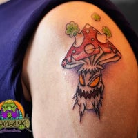 Photo taken at Purple Dick - Tattoo Studio by Serj D. on 4/3/2012