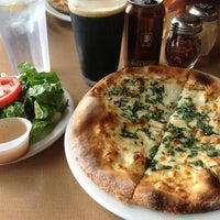 Photo taken at Tosca Stone Oven Pizzeria by Ep C. on 7/10/2012