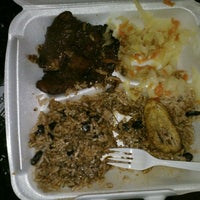 Photo taken at Jamaica Jerk Spice by Peter K. on 6/16/2012