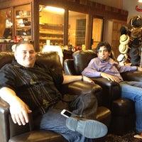 Photo taken at En Fuego Cigars &amp; Lounge by Bill C. on 4/27/2012