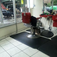 Photo taken at Dominguez Barbershop by Jose M. on 8/10/2012