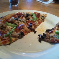 Photo taken at California Pizza Kitchen by Tatianna V. on 2/19/2012