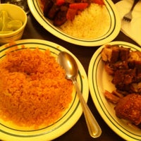 Photo taken at Caridad Restaurant by Jay T. on 2/22/2012