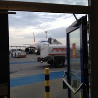 Photo taken at Gate 58 by Ivan P. on 6/15/2012