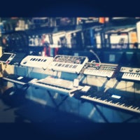 Photo taken at Long &amp; McQuade Musical Instruments by Justin G. on 5/30/2012