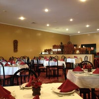 Photo taken at India House Restaurant by Christine W. on 8/22/2012