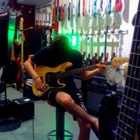 Photo taken at Just Music by Anda P. on 7/26/2012