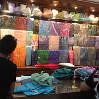 Photo taken at Omar Ali Boutique (TTDI) by Lily I. on 8/11/2012