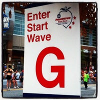 Photo taken at Peachtree Road Race Start Wave G by Heather M. on 7/4/2012