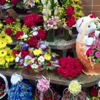 Photo taken at Floricultura Candelaria by Leandro F. on 2/23/2012