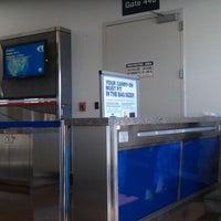 Photo taken at Gate 44J by Jackie E. on 8/31/2012