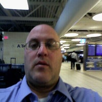 Photo taken at Gate A2 by Michael S. on 4/12/2012
