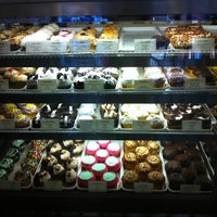 Photo taken at Crumbs Bake Shop by graceface k. on 8/26/2012