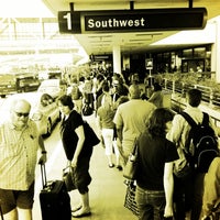 Photo taken at Gate 1 by Seamus M. on 8/25/2012
