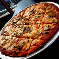 Photo taken at Imo&amp;#39;s Pizza by Leo B. on 4/7/2012