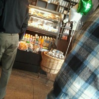 Photo taken at Starbucks by Elisa N. on 3/20/2012