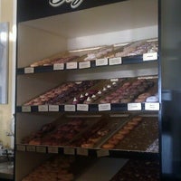 Photo taken at Glazed Doughnuts &amp;amp; Cafe by Alex V. on 8/4/2012