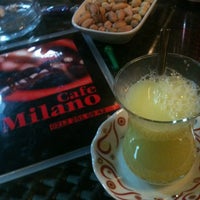 Photo taken at Cafe Milano by Ahmet G. on 3/9/2012