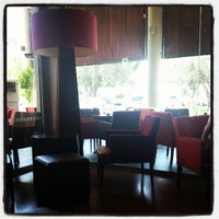 Photo taken at Gloria Jeans Coffees by Γρηγόρης Τ. on 7/21/2012