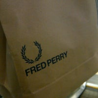 Photo taken at FRED PERRY by Kariage Yun on 5/2/2012