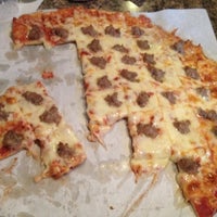 Photo taken at Tasty Pizza - Hangar 45 by Jill C. on 3/15/2012