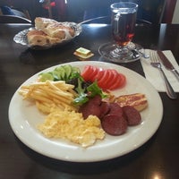 Photo taken at Evin Cafe by Ahmet K. on 6/17/2012