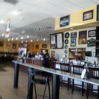 Photo taken at Straw Hat Pizza by Paul E. on 6/1/2012