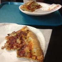 Photo taken at College Town Pizza by Dennis Z. on 3/3/2012