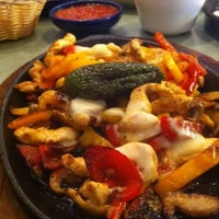 Photo taken at Cancun Mexican Restaurant by Etta W. on 4/22/2012