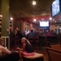 Photo taken at The Cove Bar and Grill at Bayside by Albie S. on 9/2/2012