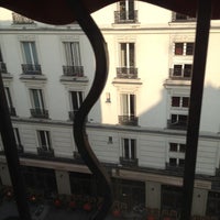 Photo taken at Bastille Hostel by Juliana K. on 6/20/2012