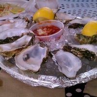 Photo taken at Pelly&amp;#39;s Fish Market &amp;amp; Café by Aaron J. on 7/5/2012