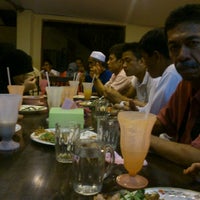 Photo taken at difiqa restaurant by Nuraida H. on 6/30/2012