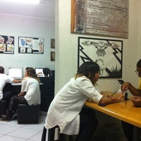 Photo taken at Gelly&amp;#39;s Tattoo by Boni L. on 4/13/2012