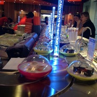 Photo taken at Yo! Sushi by Phil T. on 8/10/2012