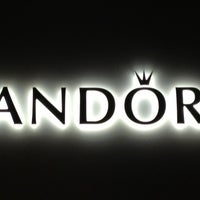 Photo taken at PANDORA Ginza Flagship Store by Yumi K. on 6/27/2012