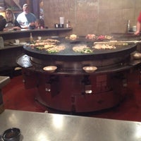 Photo taken at bd&amp;#39;s Mongolian Grill by Geoffréy G. on 3/28/2012