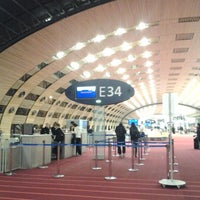 Photo taken at Gate E34 by Alexander M. on 4/4/2012