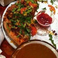 Foto tomada en Knollas Pizza  por Ashley V. el 5/29/2012
