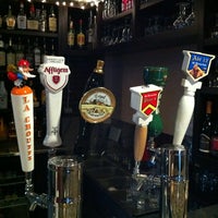 Photo taken at The Globe Belgian Gastropub by Amy C. on 4/3/2012