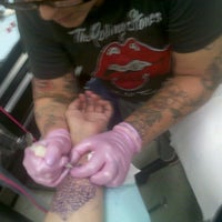 Photo taken at Emerald City Tattoo &amp;amp; Supply by Michael L. on 7/28/2012
