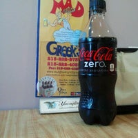 Снимок сделан в Mad Greeks Pizza &amp;amp; Take-Out Beer пользователем John M. 8/18/2012