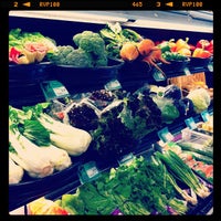 Photo taken at Pogue&amp;#39;s Run Grocer by Christopher G. on 3/16/2012