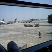 Photo taken at Gate 58A by Nadia A. on 5/11/2012