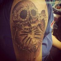 Photo taken at Archer Avenue Tattoo by Rob M. on 3/22/2012