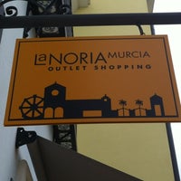 Photo taken at La Noria Outlet Shopping by Rodrigo C. on 8/1/2012