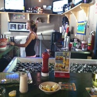 Photo taken at Hot Caboose Island Grille by Tracey on 8/14/2012