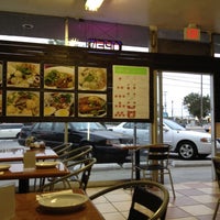 Photo taken at Moo Moo Thai Cafe by David N. on 6/12/2012